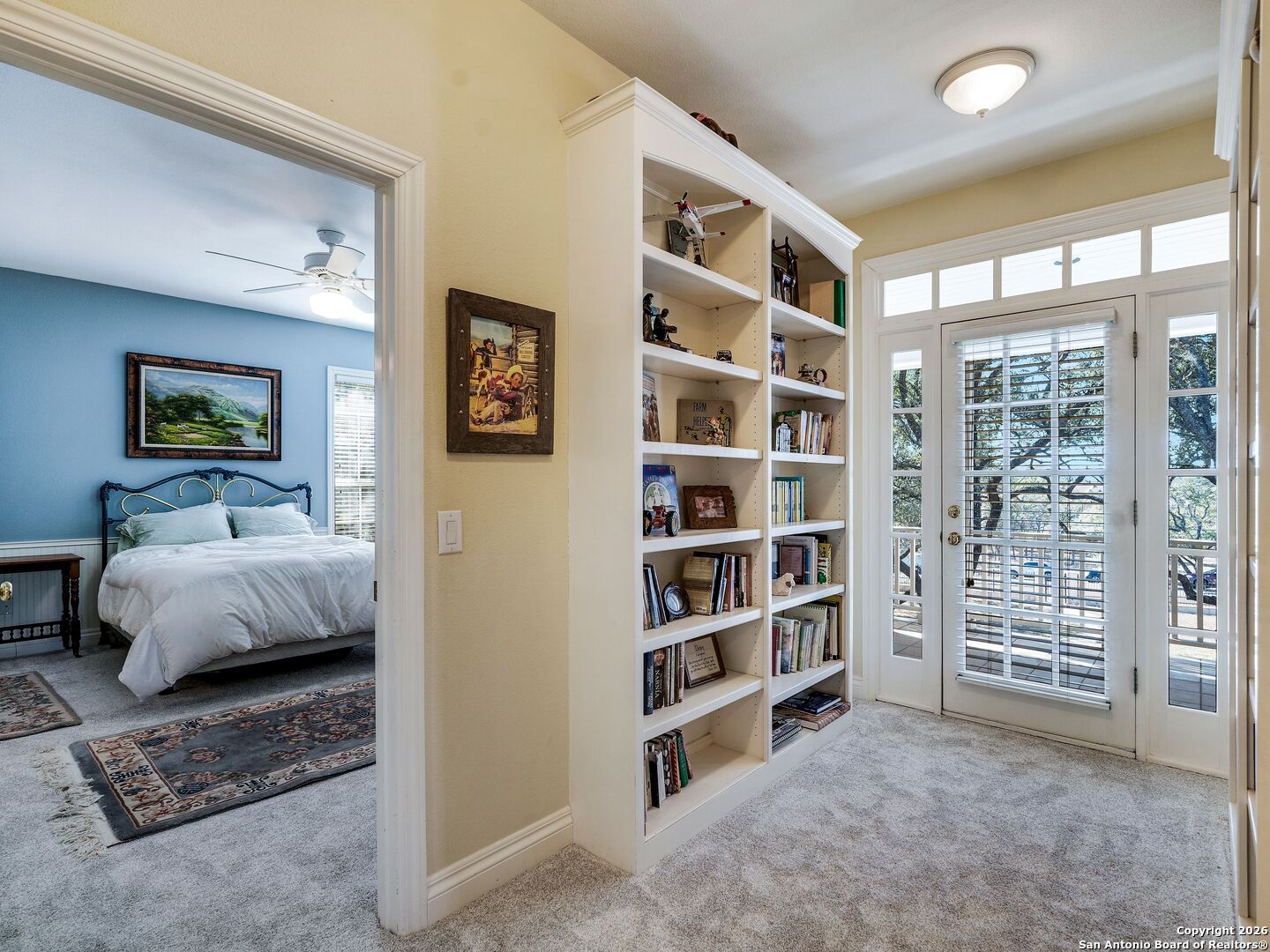 155 Cibolo Ridge Trail Boerne, TX 78015 - Photo 58 of 100 a bedroom with a bed and a walk in closet