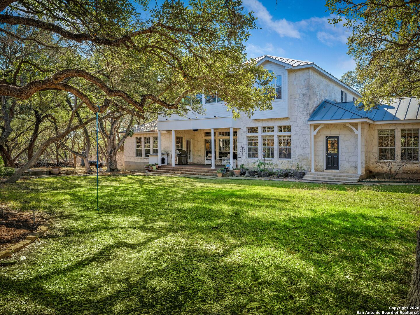 155 Cibolo Ridge Trail Boerne, TX 78015 - Photo 70 of 100 a front view of a house with a garden