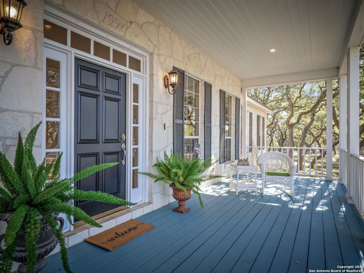 155 Cibolo Ridge Trail Boerne, TX 78015 - Photo 8 of 100 a living room filled with furniture window and wooden floor