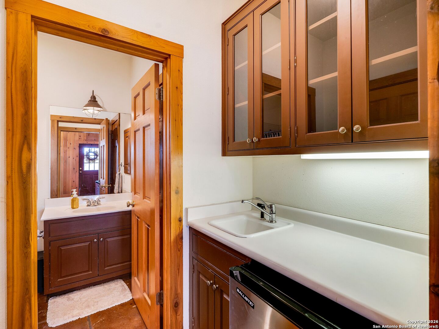 155 Cibolo Ridge Trail Boerne, TX 78015 - Photo 95 of 100 a bathroom with a sink and a mirror