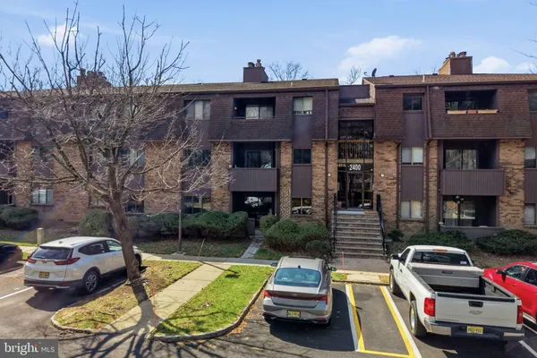 a car parked in front of a house
