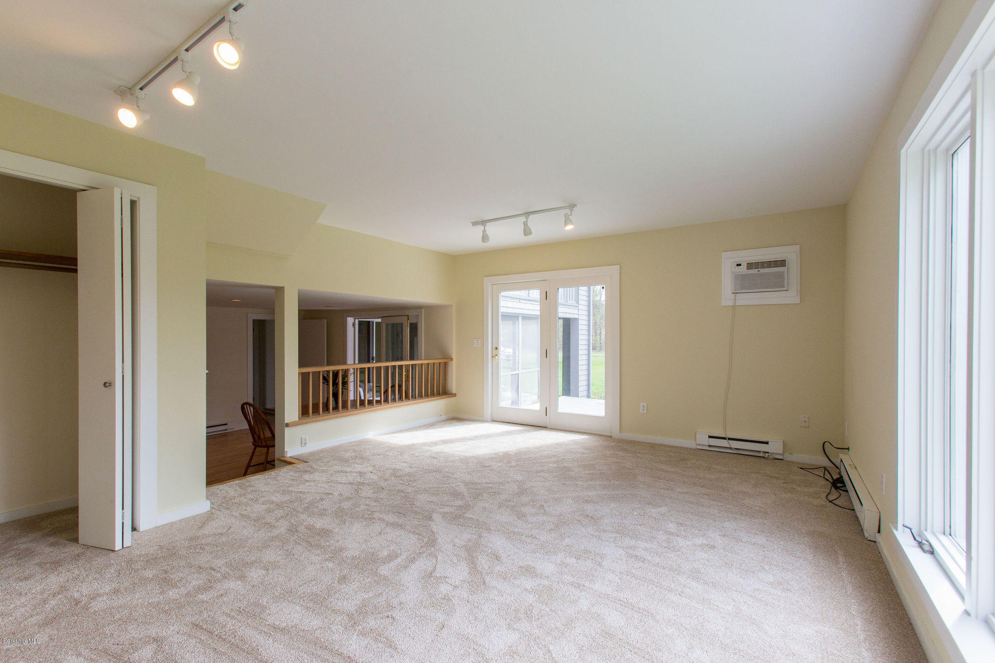 2 Wallace Road, Unit 1E Stockbridge, MA 01262 - Photo 11 of 22 Living Room w/ French Doors to Deck