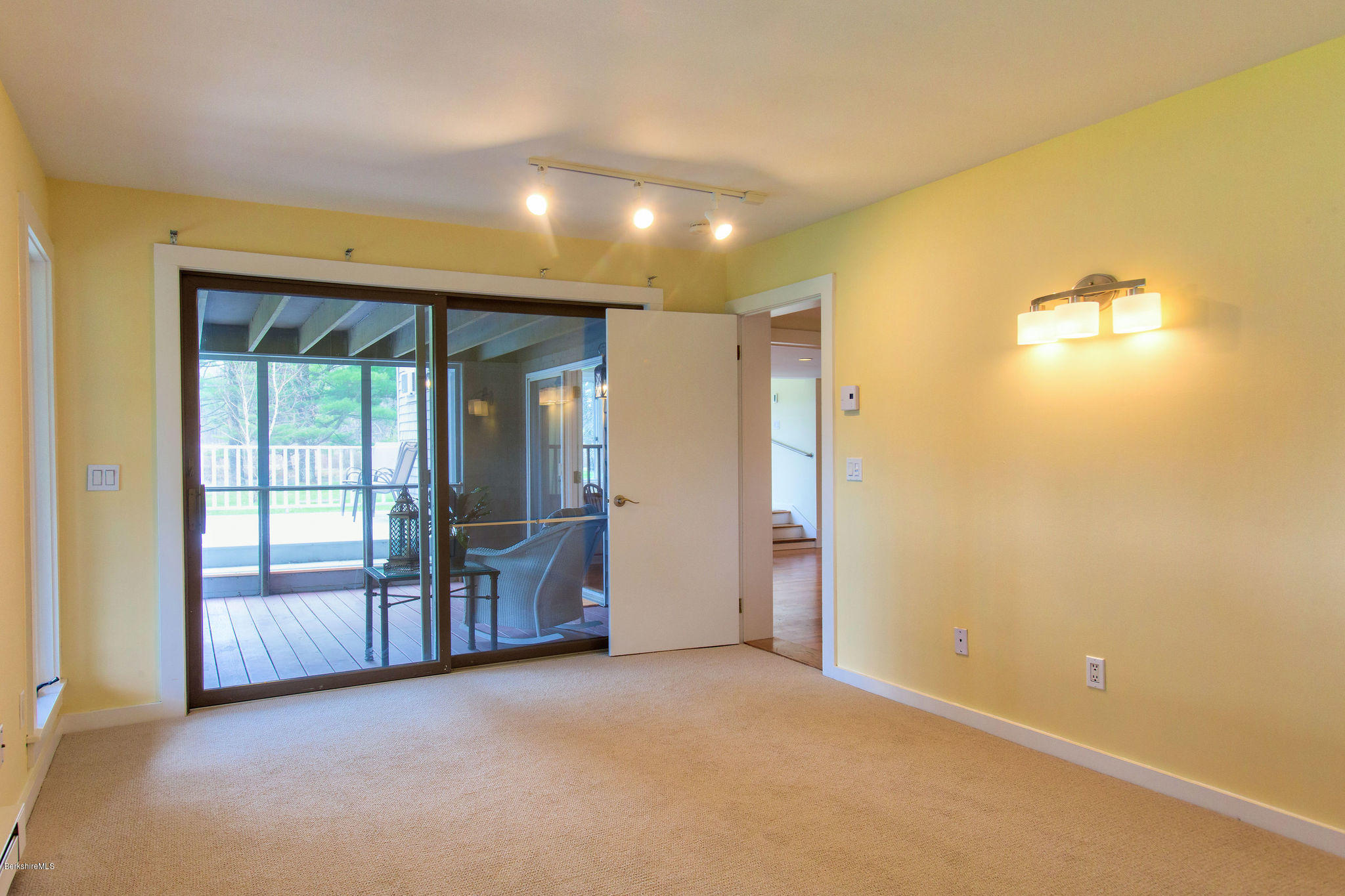 2 Wallace Road, Unit 1E Stockbridge, MA 01262 - Photo 18 of 22 NE Bedroom w/ Slider to Screened Porch