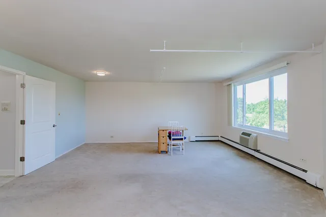 an empty room with a window