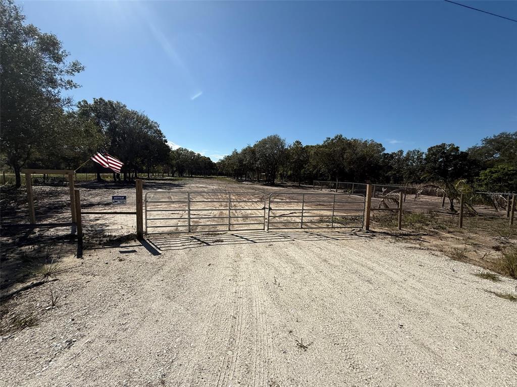 17618 Northwest 286th Street Okeechobee, FL 34972 - Photo 10 of 18 a view of outdoor space with trees