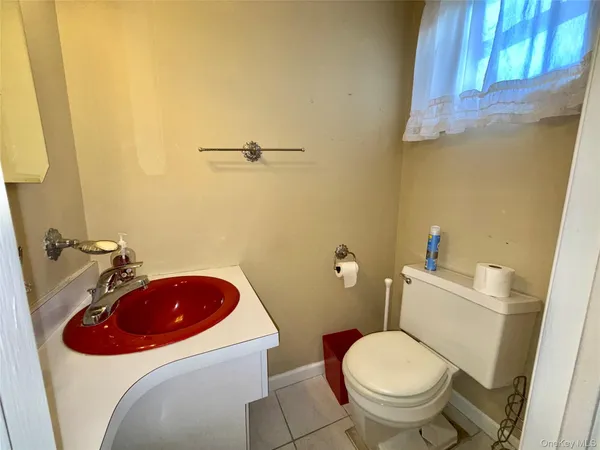 a bathroom with a sink and a toilet