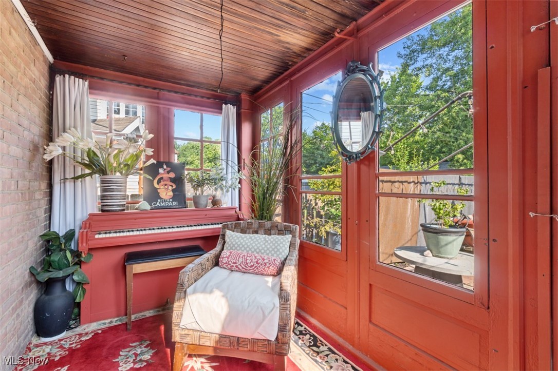 3609 Northcliffe Road University Heights, OH 44118 - Photo 13 of 26 Sunroom / solarium with brick wall and wooden ceiling