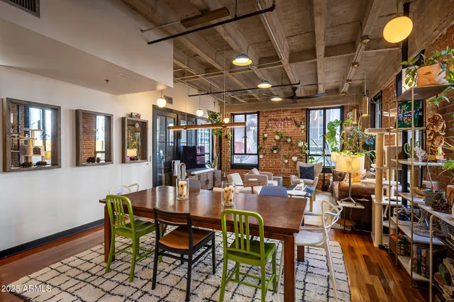 a large kitchen with stainless steel appliances kitchen island granite countertop a stove and a sink