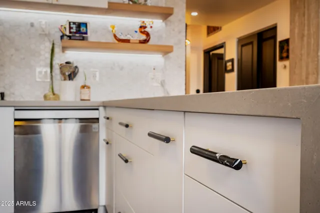 a room with furniture and a large window