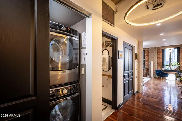 a room with furniture and pool table