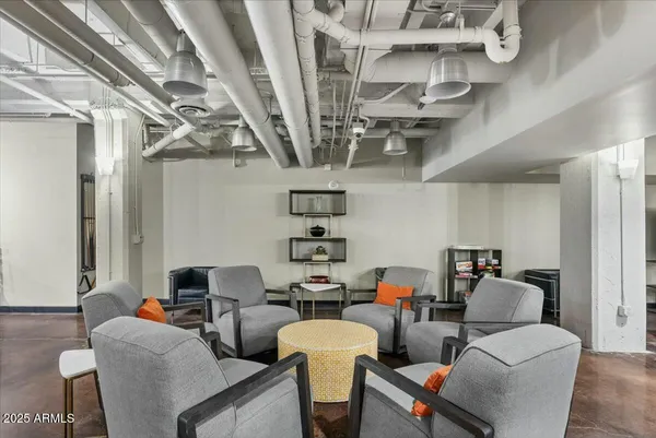 a room with lots of table and chairs