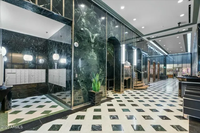 a hallway with painting and wooden floor