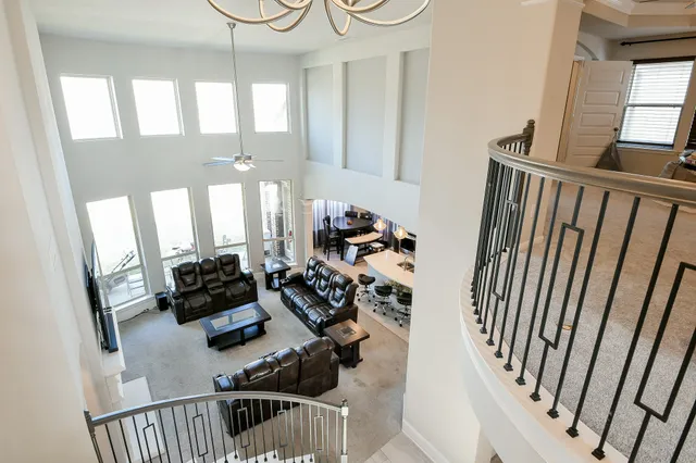a view of a livingroom with furniture and a window