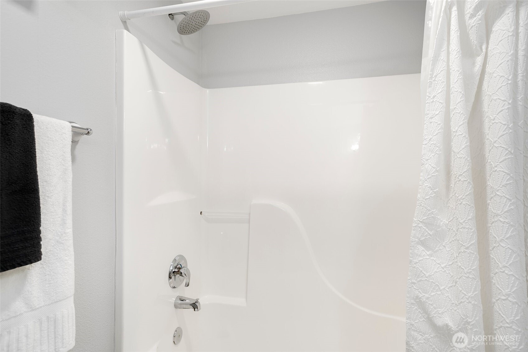 5430 California Avenue Southwest, Unit 3A Seattle, WA 98136 - Photo 24 of 32 a bathroom with a shower