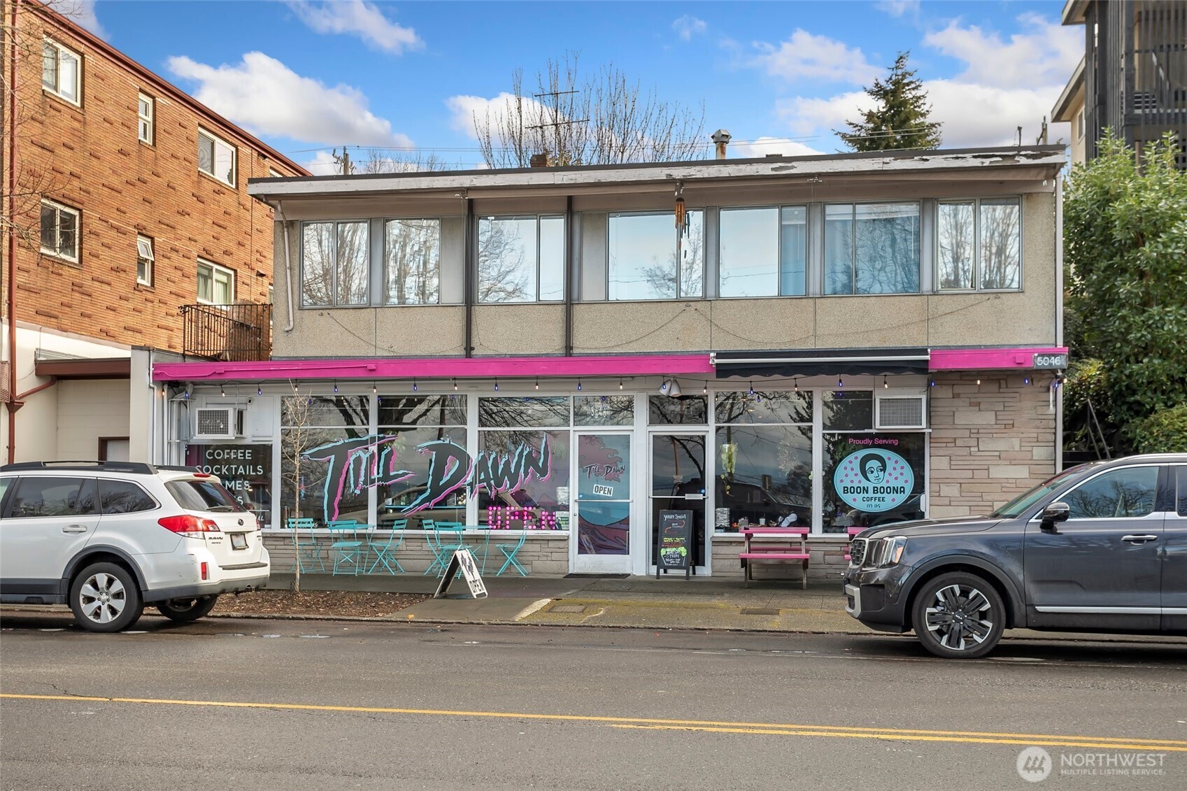 5430 California Avenue Southwest, Unit 3A Seattle, WA 98136 - Photo 32 of 32 a car parked in front of a store