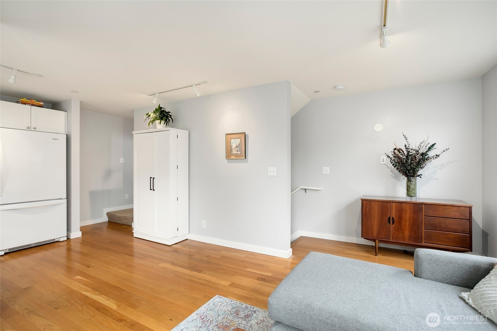 5430 California Avenue Southwest, Unit 3A Seattle, WA 98136 - Photo 7 of 32 a bedroom with a bed and a couch