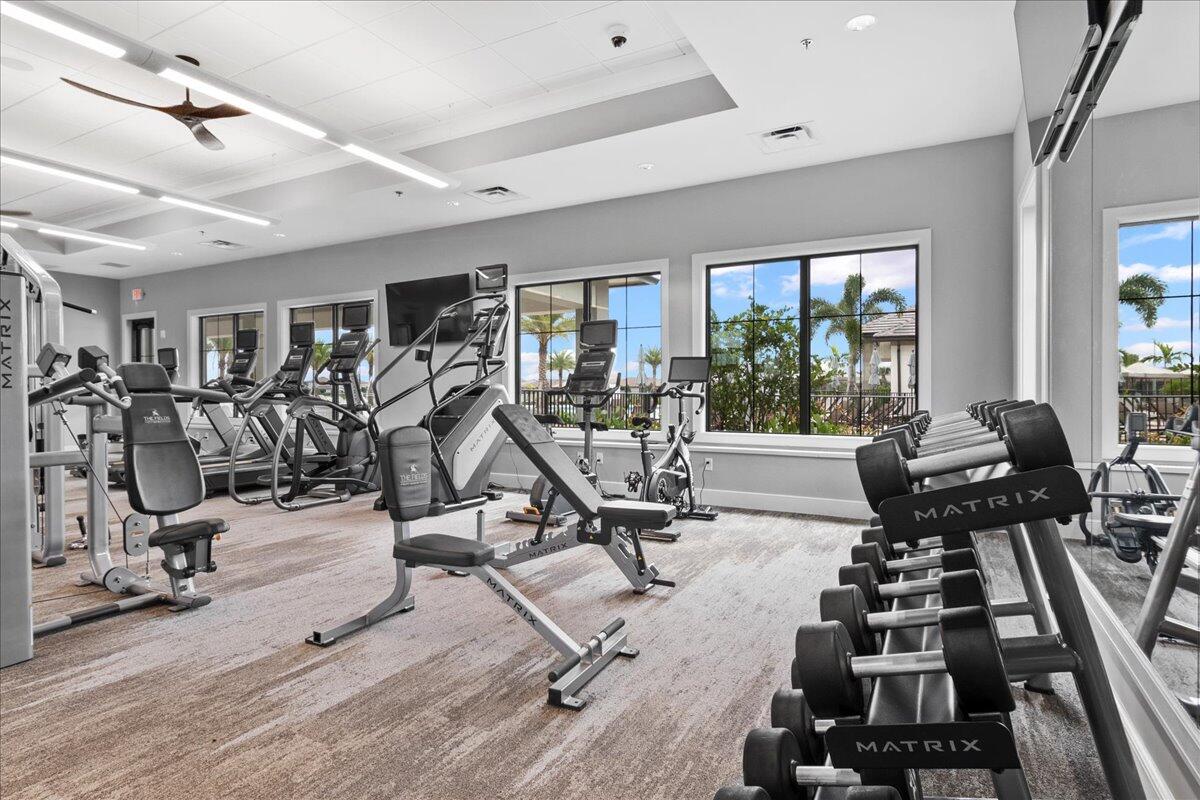 8311 Pedigree Circle Lake Worth, FL 33467 - Photo 29 of 37 a view of a room with gym equipment