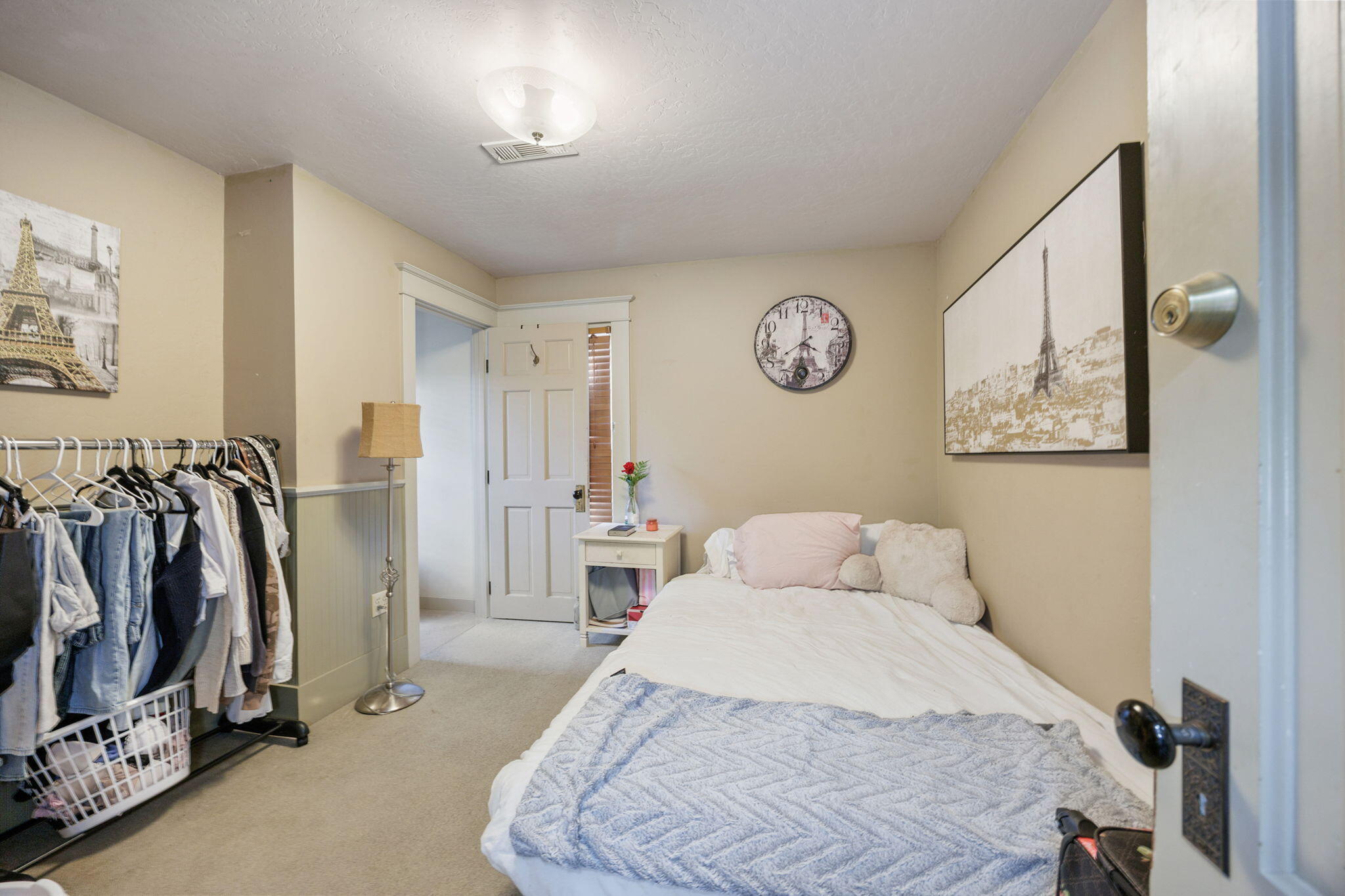 75 Wimer Street Ashland, OR 97520 - Photo 24 of 44 a bedroom with a bed and a walk in closet