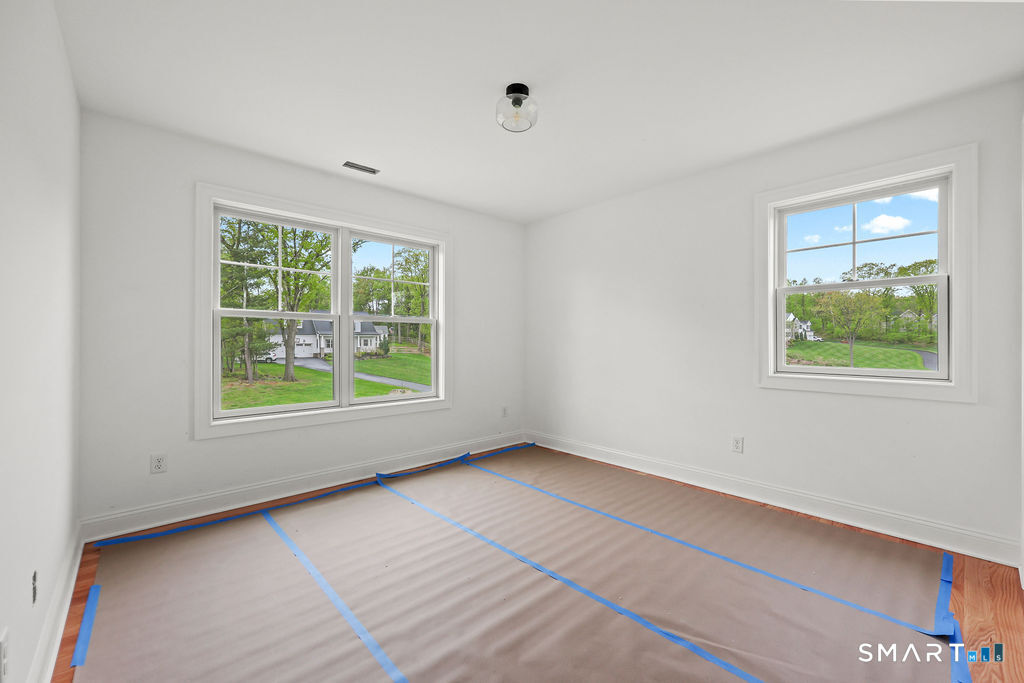 8 Ridgewood Club Road Prospect, CT 06712 - Photo 25 of 40 a view of an empty room with a window