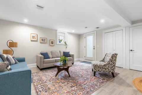 a living room with furniture and a couch