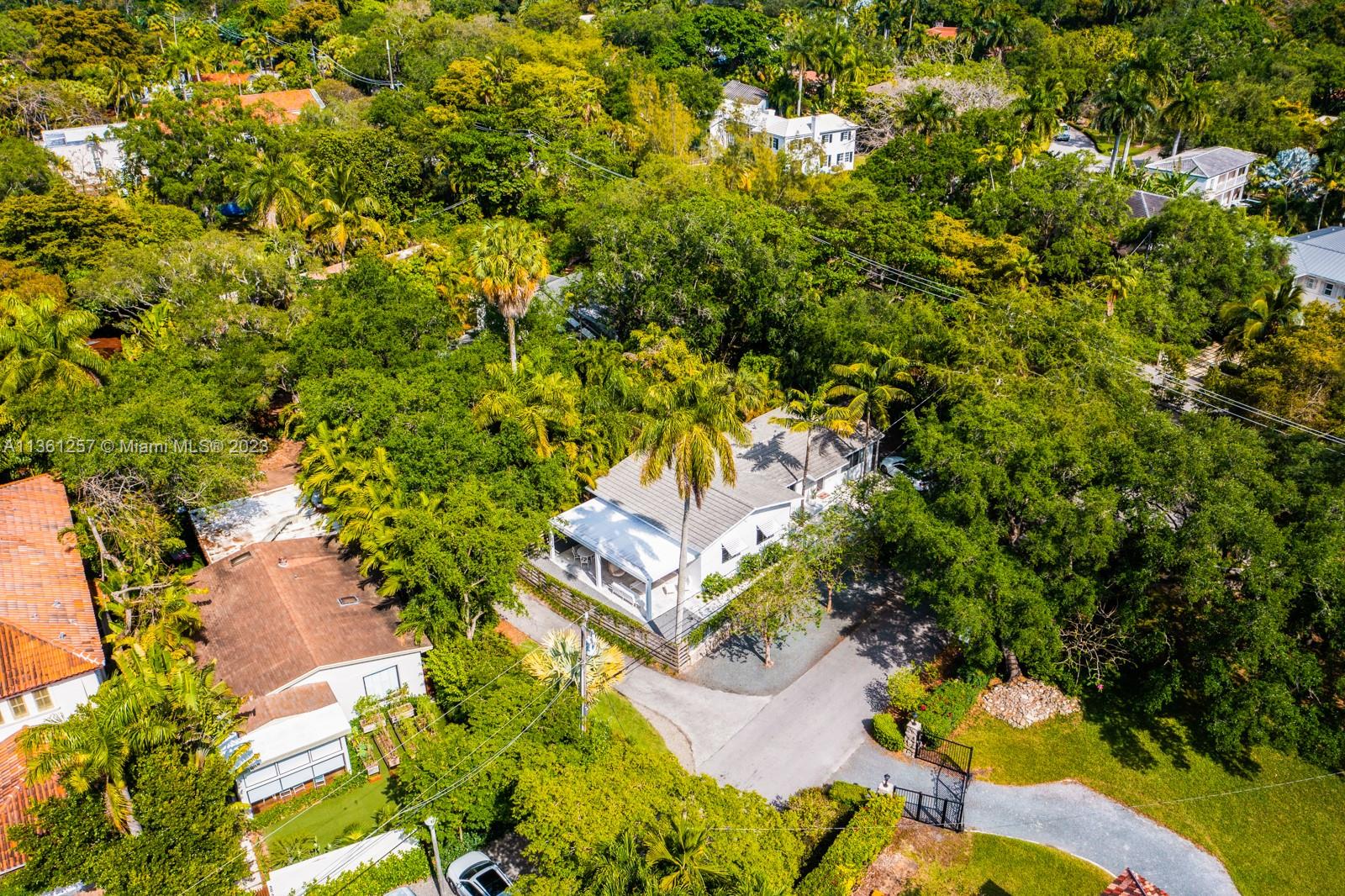 3894 Main Highway Coconut Grove, FL 33133 - Photo 28 of 28 view of a yard with plants