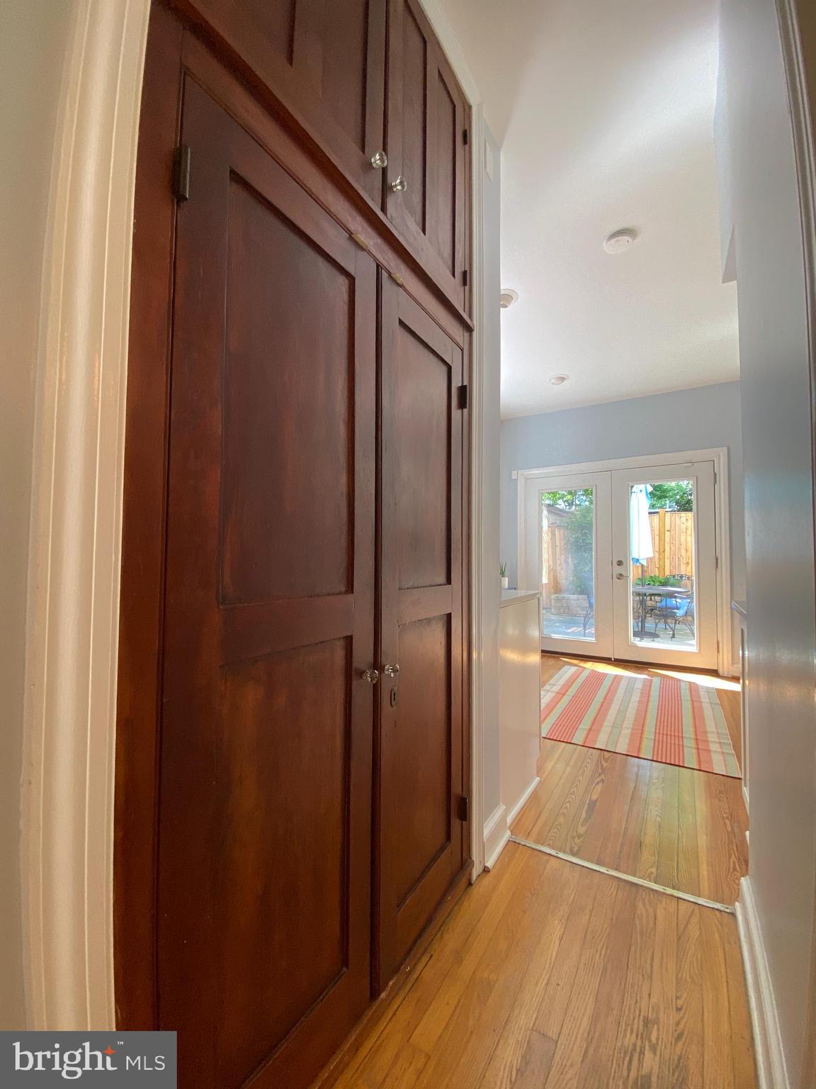 707 10th Street Southeast Washington, DC 20003 - Photo 14 of 46 Floor to ceiling pantry w/historic cabinet doors