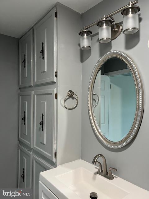 206 Stevens Road Middle River, MD 21220 - Photo 17 of 31 Sleek gray bathroom with elegant fixtures.