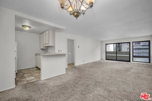 a view of kitchen and windows