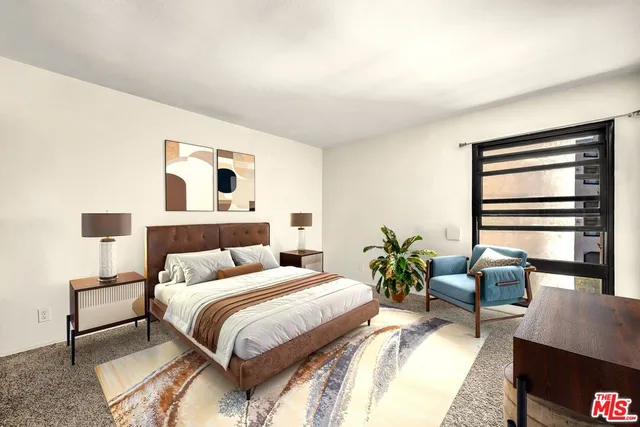 a view of a livingroom with furniture and wooden floor