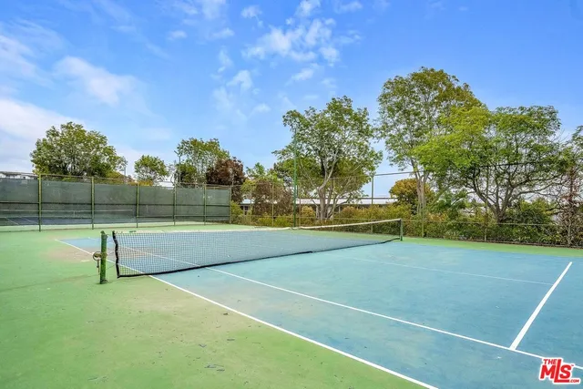 a view of outdoor space and tennis court