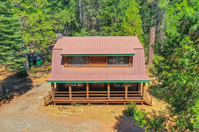 a kitchen with stainless steel appliances granite countertop a refrigerator stove and sink