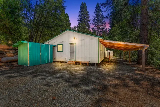 a front view of a house with a garage