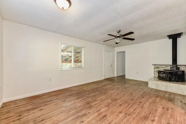 a bed room with a bed and a desk