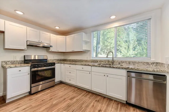a backyard of a house with lots of green space