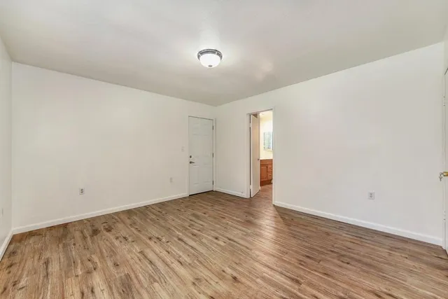 a backyard of a house with lots of green space