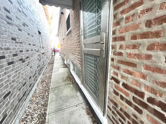 a view of a pathway with a building in the background