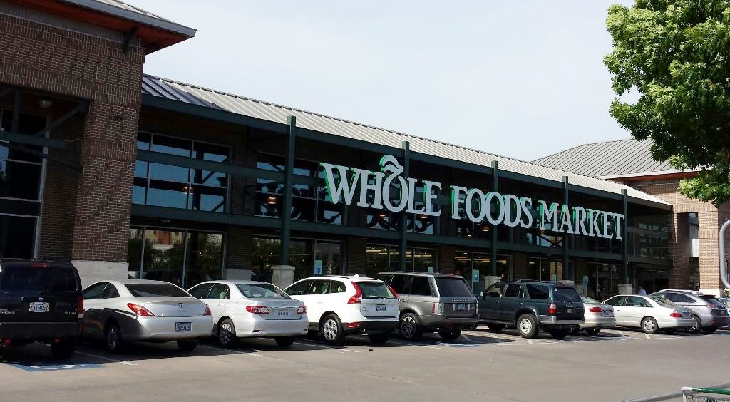 2701 Westheimer Road, Unit 8B Houston, TX 77098 - Photo 27 of 28 a couple of cars parked in front of building