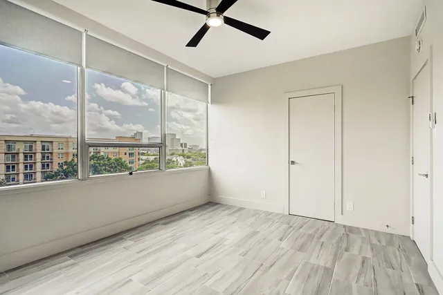 a view of an empty room with a window