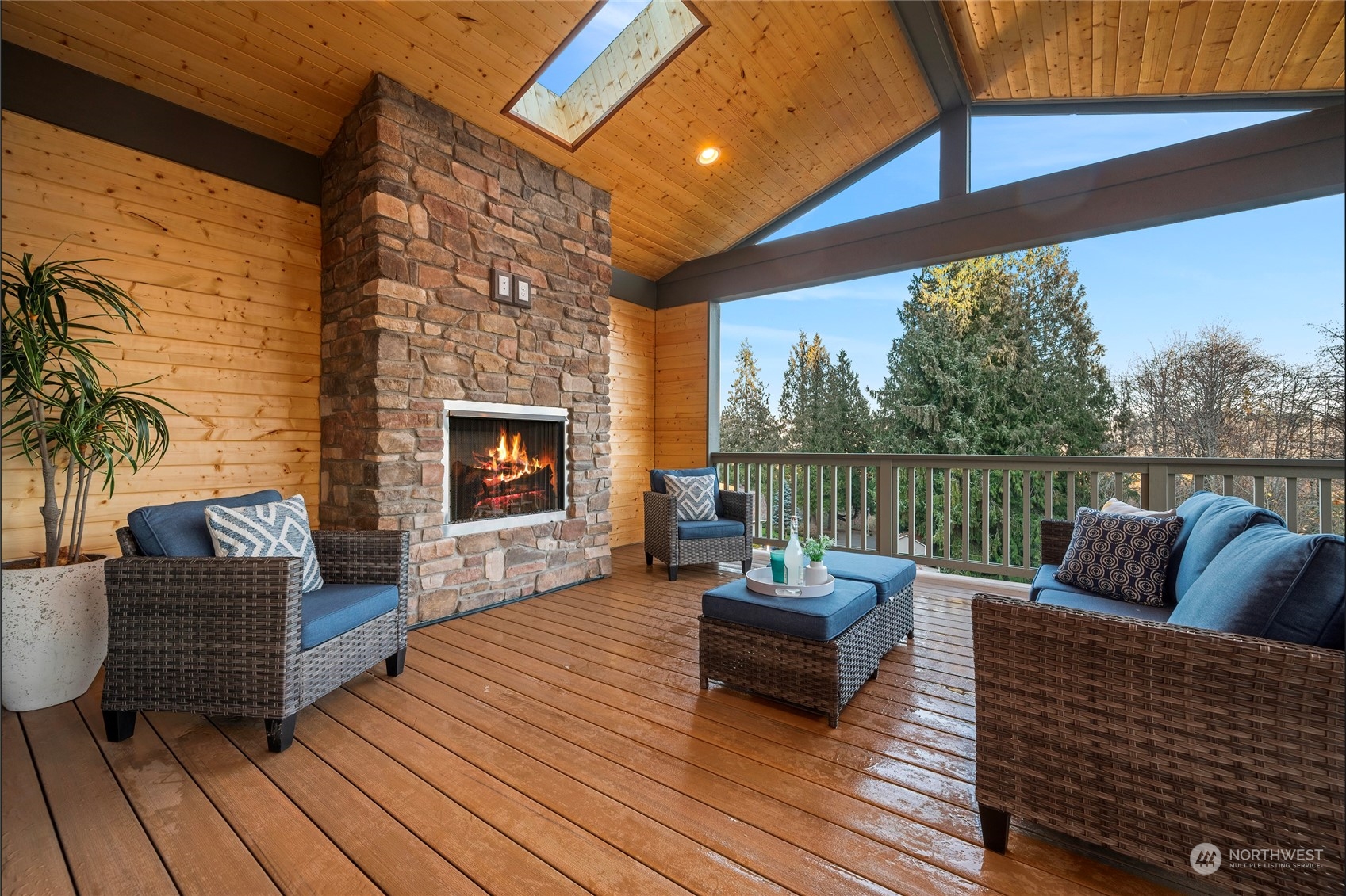 324 174th Street Southeast Bothell, WA 98012 - Photo 18 of 37 a balcony with furniture and a fireplace
