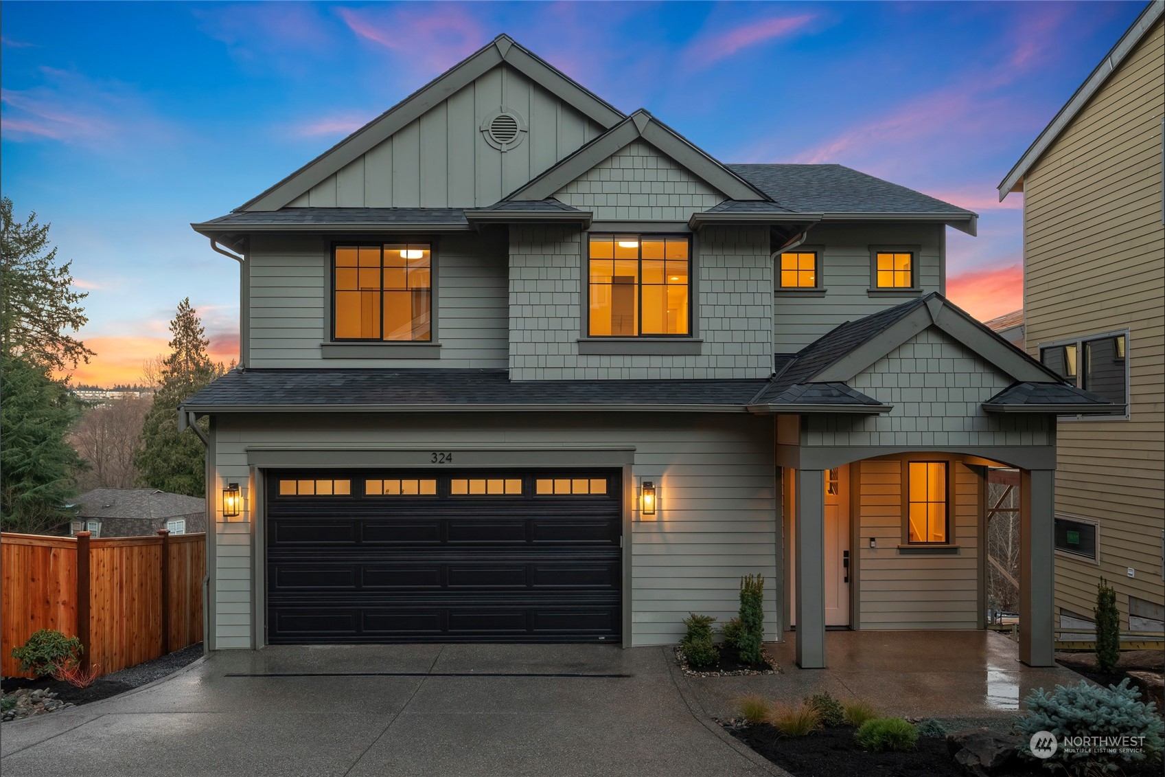 324 174th Street Southeast Bothell, WA 98012 - Photo 2 of 37 a front view of a house with a yard