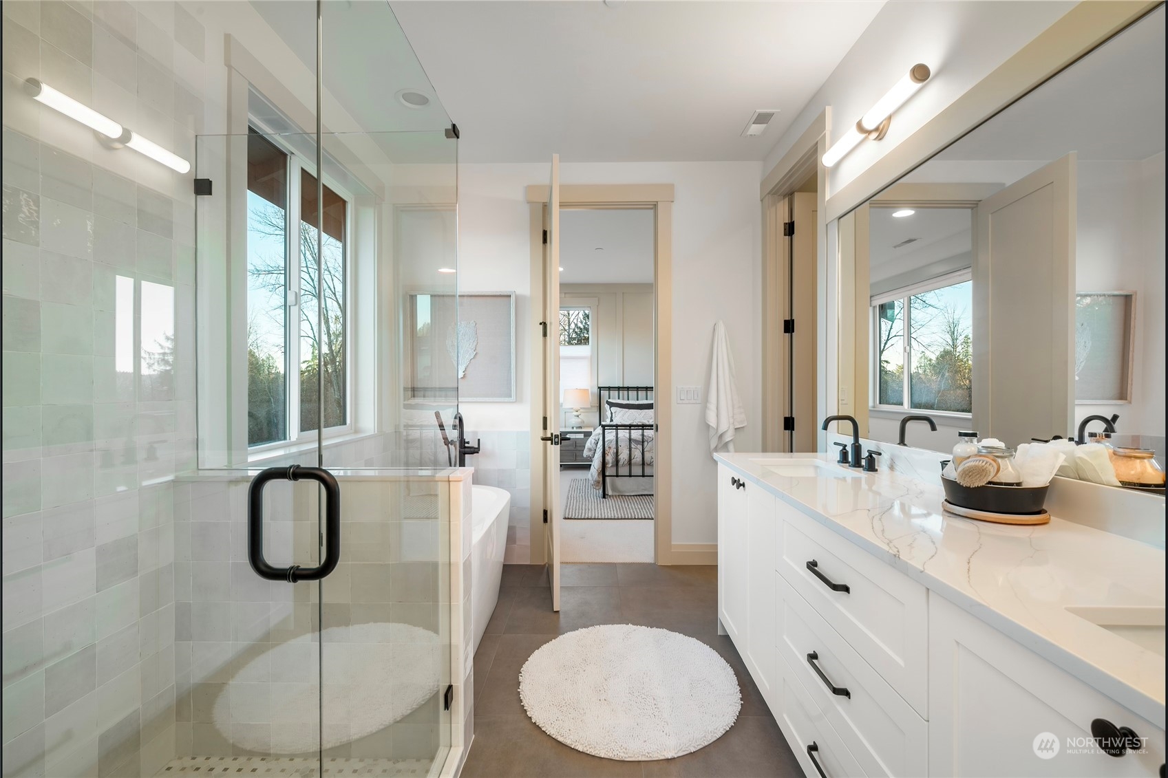324 174th Street Southeast Bothell, WA 98012 - Photo 27 of 37 a bathroom with a granite countertop sink and a mirror