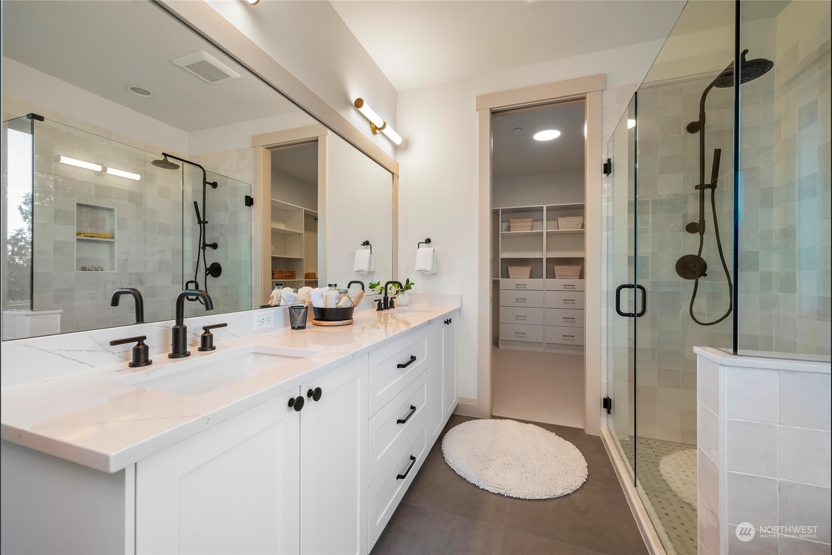 324 174th Street Southeast Bothell, WA 98012 - Photo 29 of 37 a bathroom with a double vanity sink mirror double shower and a toilet