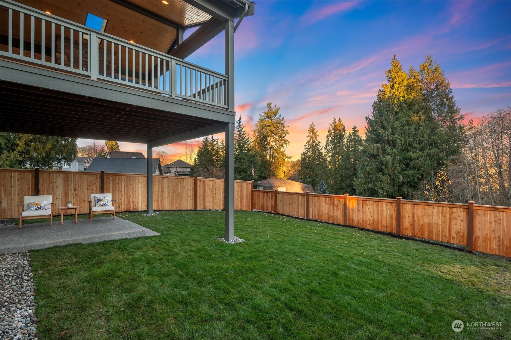 324 174th Street Southeast Bothell, WA 98012 - Photo 36 of 37 a view of a backyard with a deck and wooden fence