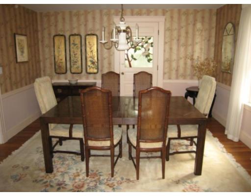 30 Spring Street Lexington, MA 02421 - Photo 10 of 18 a view of a dining room with furniture and a rug