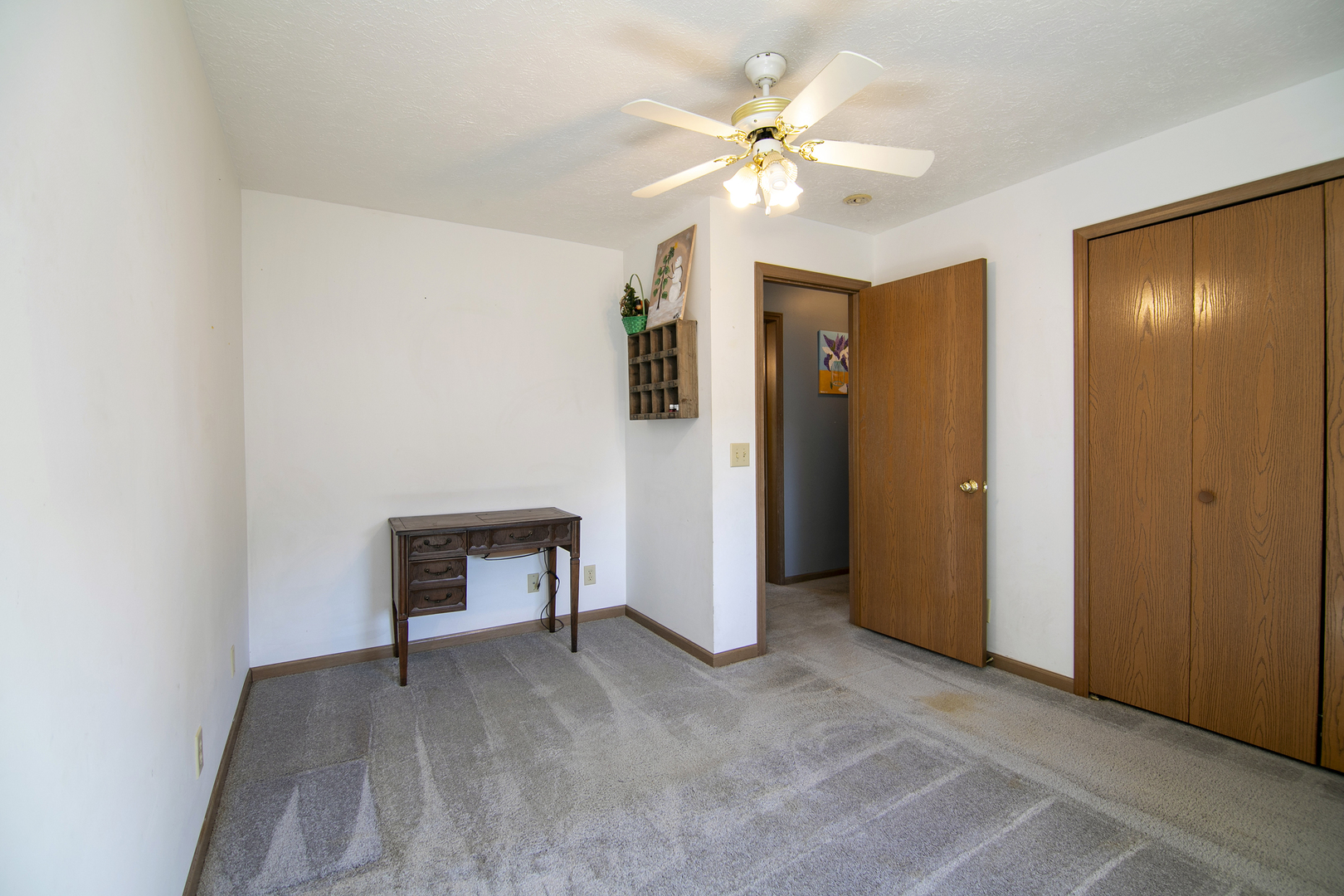 126 East Cleveland Street Cullom, IL 60929 - Photo 18 of 29 a view of an empty room with a bathroom