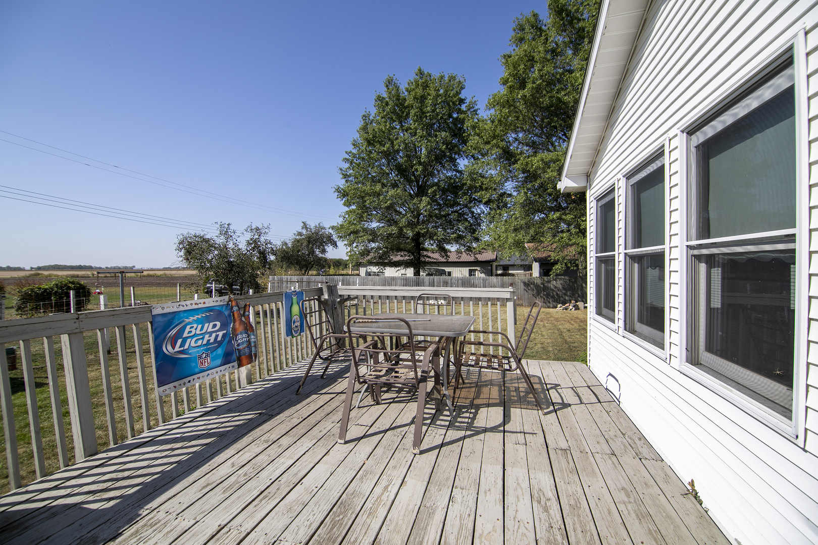 126 East Cleveland Street Cullom, IL 60929 - Photo 22 of 29 a view of balcony with wooden floor and outdoor seating
