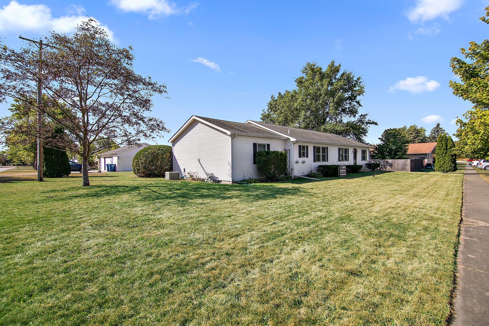126 East Cleveland Street Cullom, IL 60929 - Photo 27 of 29 a front view of house with yard and green space