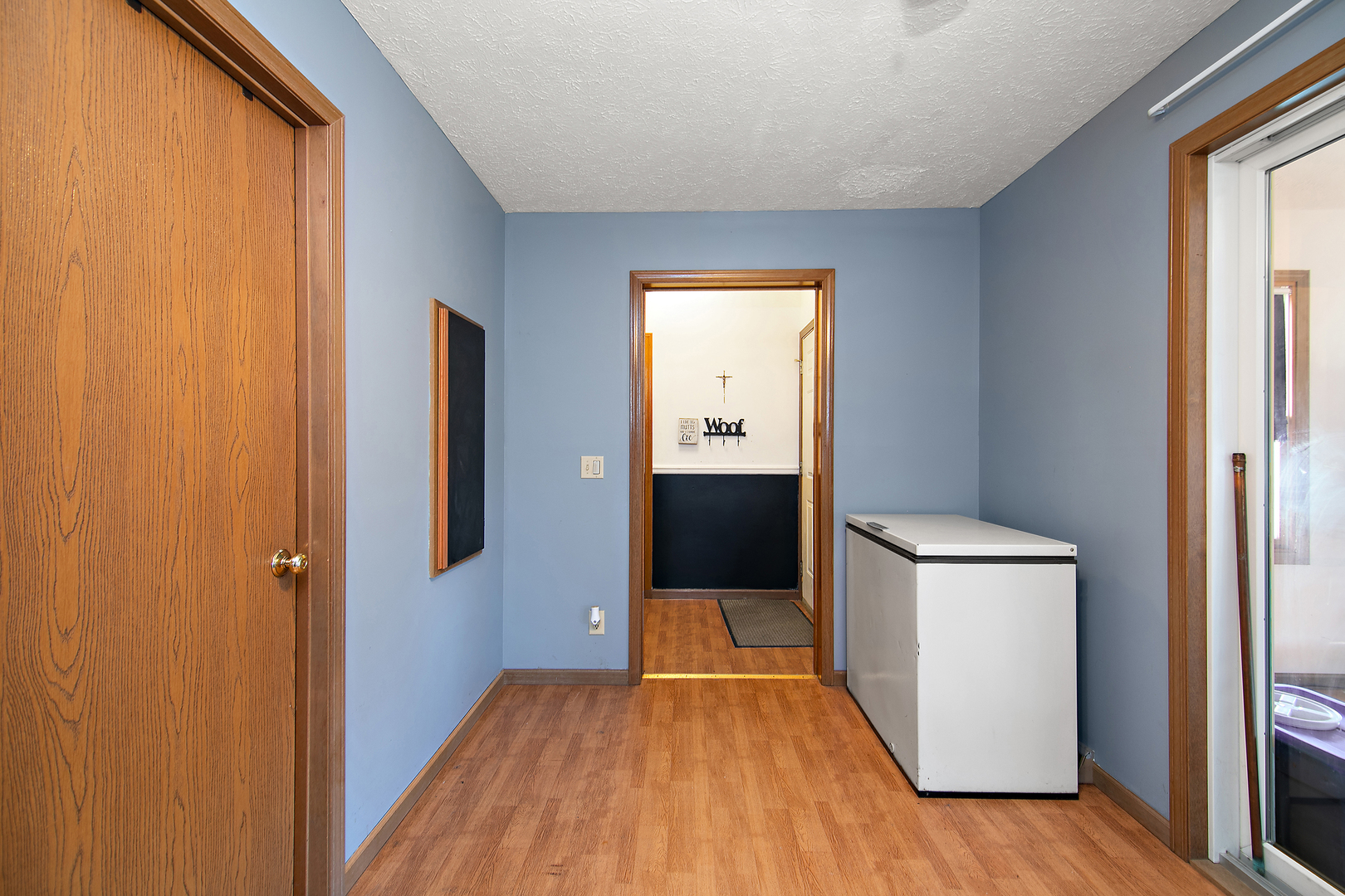 126 East Cleveland Street Cullom, IL 60929 - Photo 9 of 29 a view of a hallway with wooden floor and closet