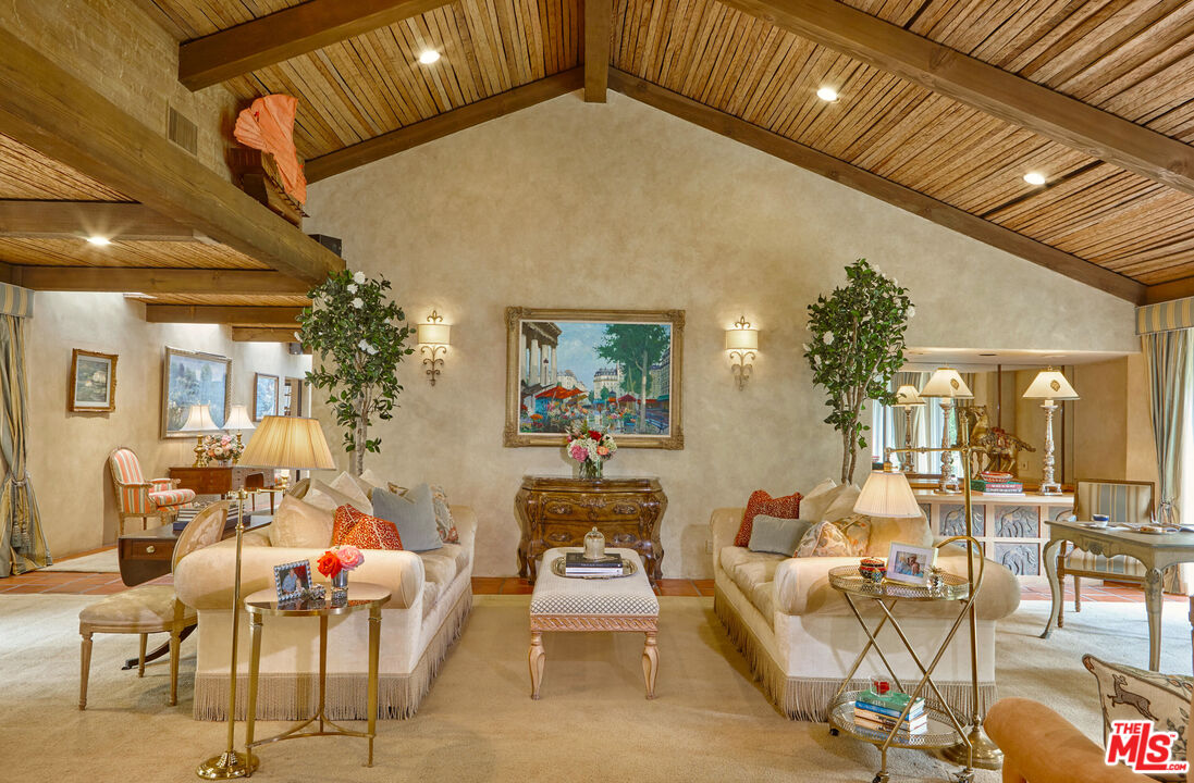 10957 Bellagio Road Los Angeles, CA 90077 - Photo 8 of 18 a living room with furniture