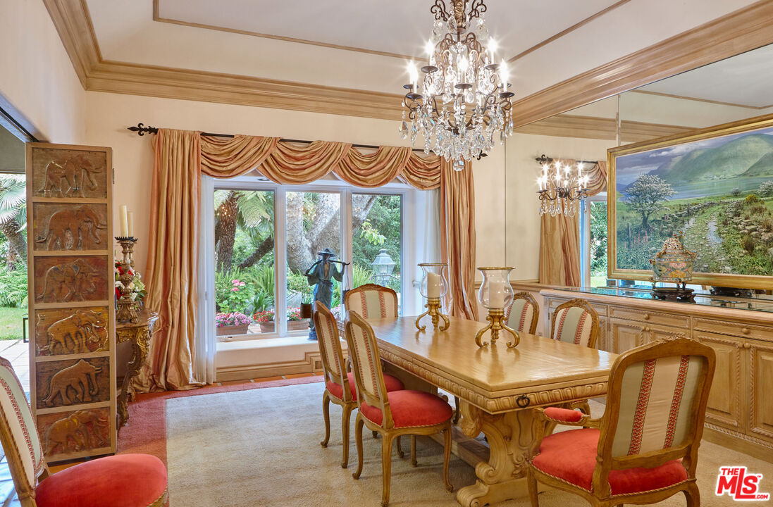 10957 Bellagio Road Los Angeles, CA 90077 - Photo 10 of 18 a view of a dining room with furniture window and outside view